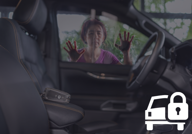 Lady panicking outside her car as she has locked herself outside the car