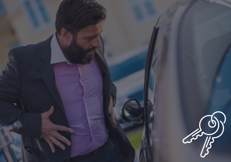 Man outside his car has lost his keys and needs an auto locksmith