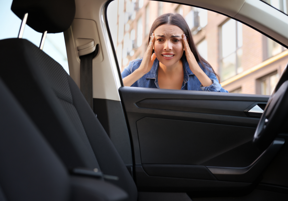 Young-woman-locked-out-of-her-car